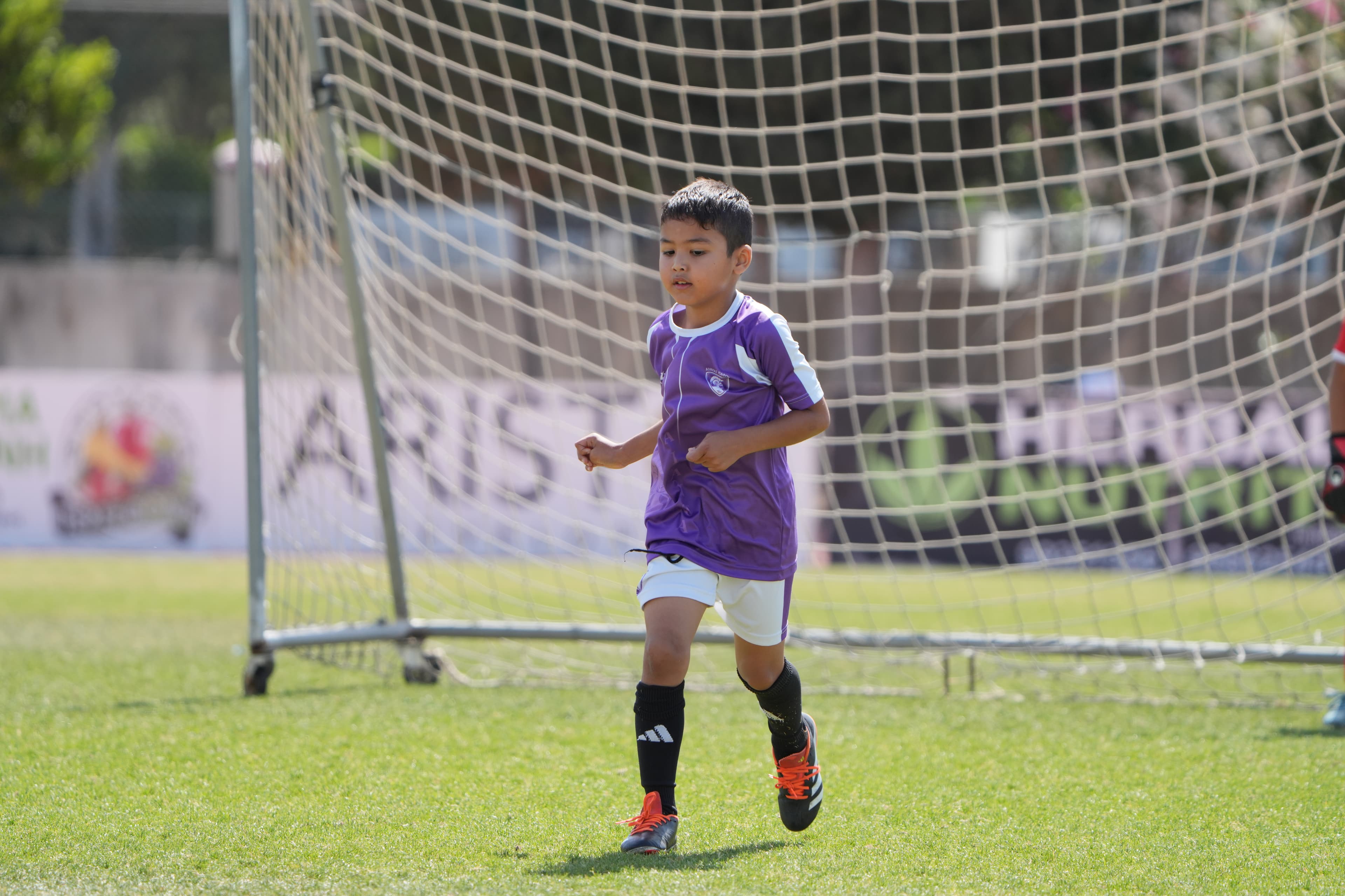 Children training together within the academy community in Paphos